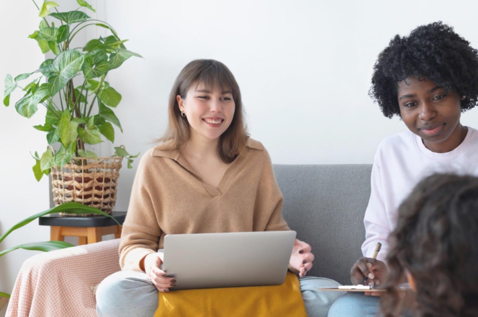 Interactive workshop session showing entrepreneurs collaborating on financial strategies